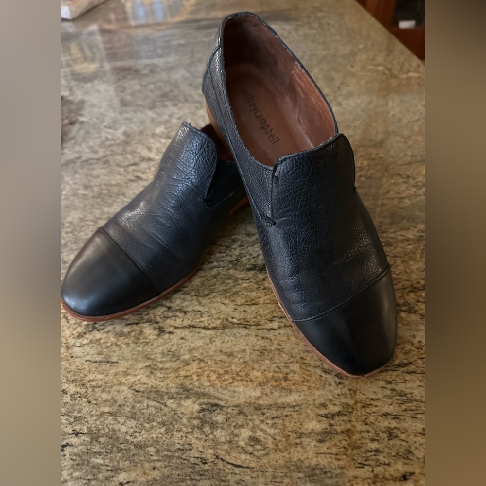 Women’s Jeffrey Campbell black leather flats.  Size 8.5